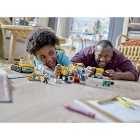 Vozidla ze stavby a demoliční koule Vozidla ze stavby a demoliční koule